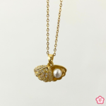 Golden Pearl in a Shell Pendant Necklace
