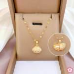 Golden Pearl in a Shell Pendant Necklace